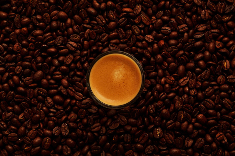 JOS-035-Espresso Shot sitting on Coffee Beans-035.jpg